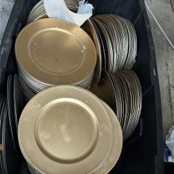 Bin Full Of Gold Plastic Plates