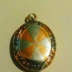 Solid gold locket tested 9+ grams