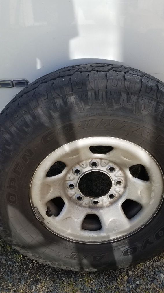 Pending sale. Lt 265 75 16 Chevrolet 8 lug rims and tires 265 75 R16 Toyo AT set of 4