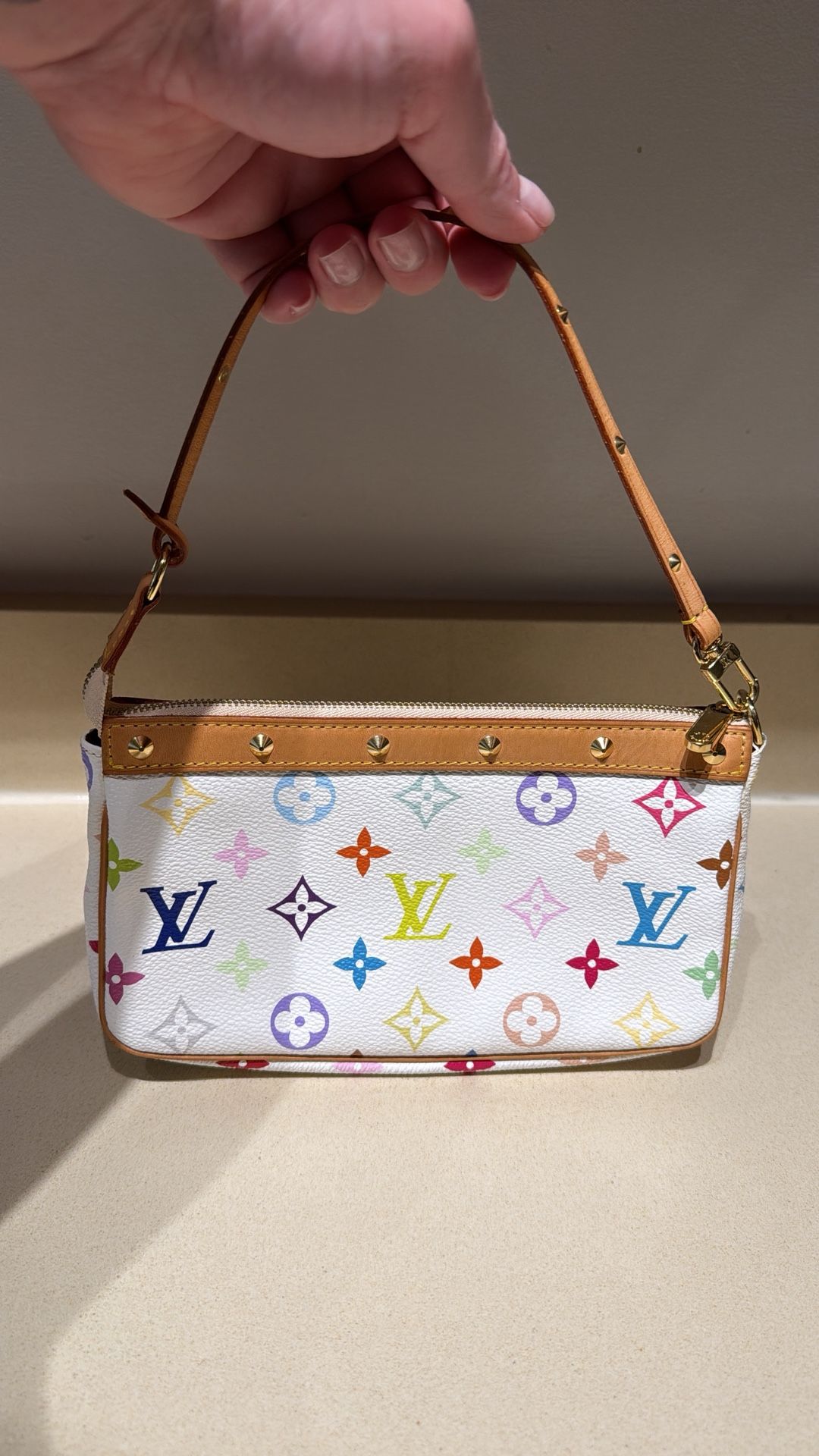 LOUIS VUITTON: Louis Vuitton x Takashi Murakami 2003 White Monogram Pochette Bag