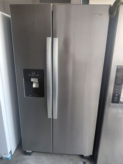 Whirlpool brand 2-door refrigerator, 36 cm wide, 69 cm high, and 29 cm deep.