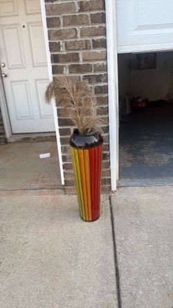 Tall red , orange and yellow vase