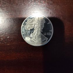 SILVER ROUND .. AMERICAN EAGLE. $90