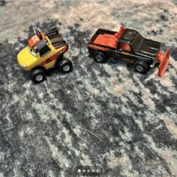 Disney Pixar Cars Dynamite and Black Snowplow Toy Trucks 