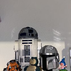 Legos R2D2, Rocket, Star Wars Mandalorian Head, Snorlax Pokemon