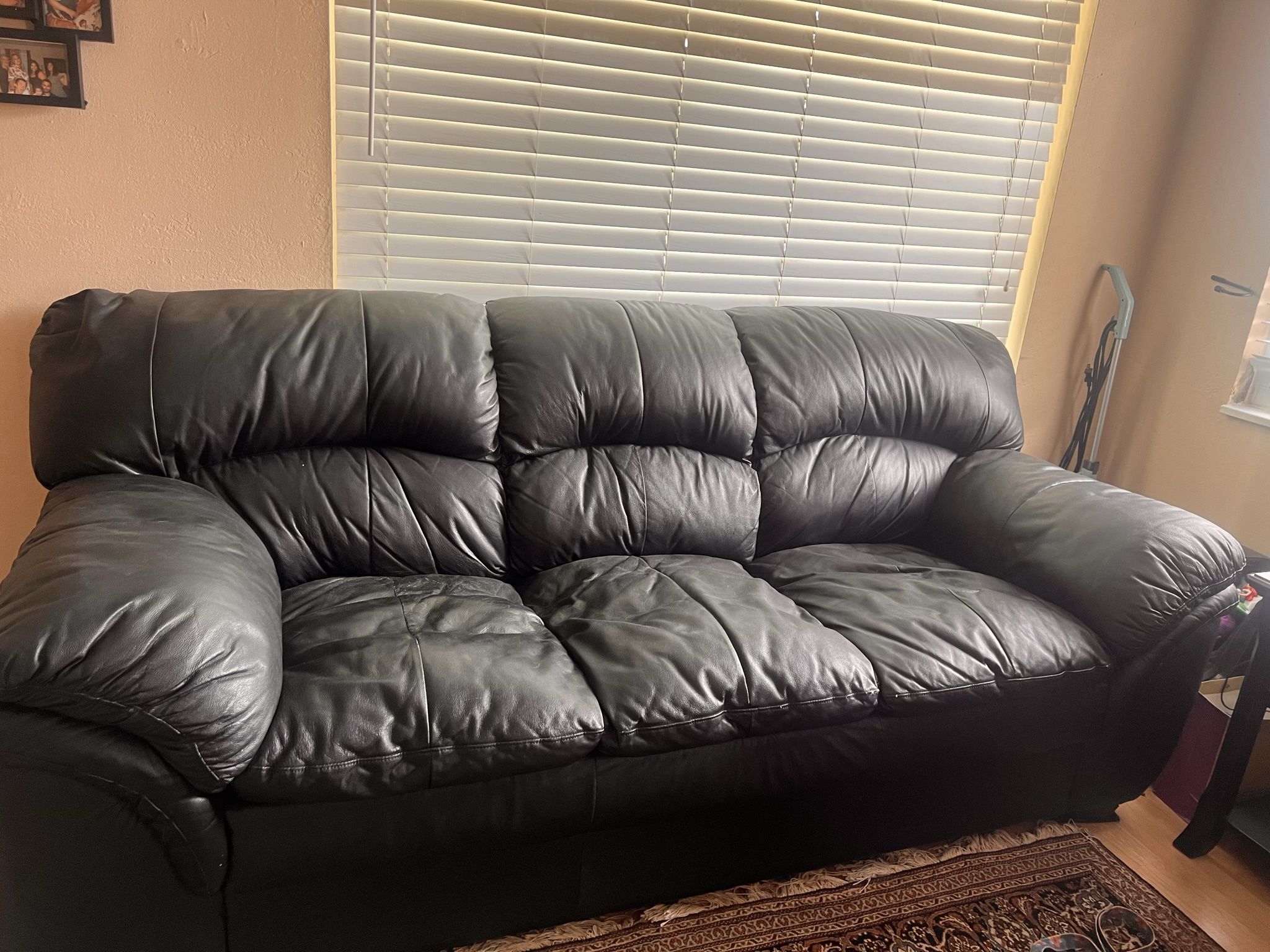 Black Three Cushion Leather Couch