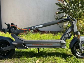 Electric Scooter (opened box) new never used good working