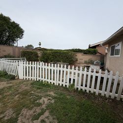 White picket fence with a 44 inch gate