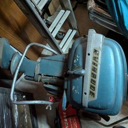 Two Outboard Motors Johnson And An Evinrude