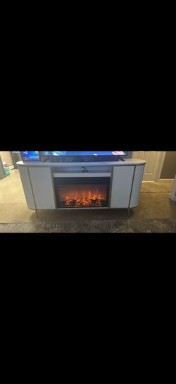 Console TV Stand With Electronic Fire Place Included