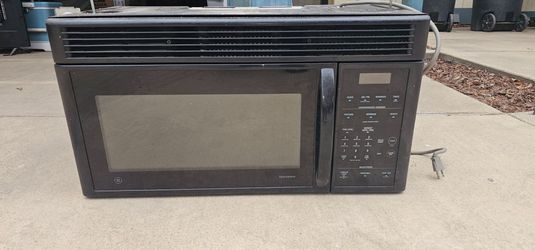 GE microwave over the oven style.