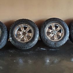 18' Chrome  wheels wrapped in 33' BF Goodrich AT tires