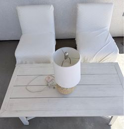 ~Used coffee table, two chairs with covers & 1 lampshade
