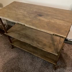 34 inches long 16 inches wide 27 inches tall solid wood desk with shelves for $25