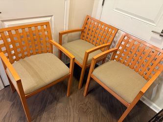 Three wood and upholstered chairs