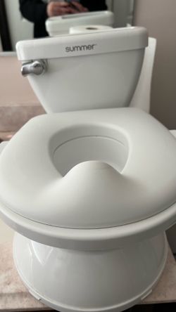Potty training toilet with a flush sound