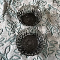 2 black glass serving bowls