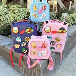 “Crocs” Style Children’s Backpacks with Swappable Logos 
