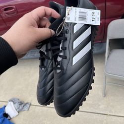 Soccer cleats turf