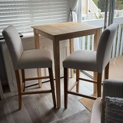 Natural Wood High Top Table And Linen Parson Chairs