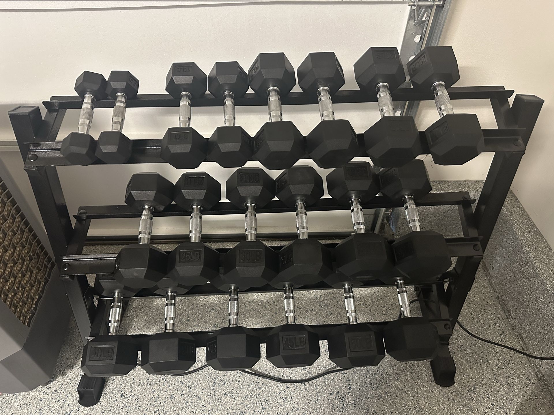 NEW IN BOX - Rubber Hex Dumbbell Set 5lb - 50lb dumbbells. >$1 per lb. 550 pounds. no rack included.