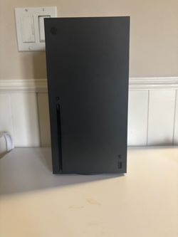 Slightly used Xbox series X with a slightly used series elite two controller
