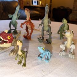 Lot of various 3-7” dinosaurs mostly genuine Jurassic Park