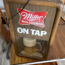 miller rotating Sign