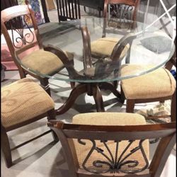 54 inch Solid Glass Table With 6 Chairs- Great condition  