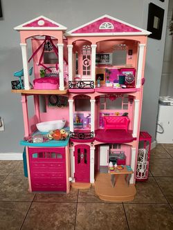 Barbie Dreamhouse with Accessories – Large Dollhouse with working elevator and garage door.