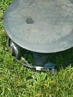 Burn pit with propane tank