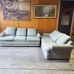 Two Same Size Teal Couches 86 Inches By 42 Inches Structually Good Cleaning Needed No Rips Or Tears