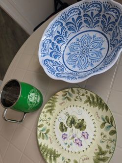 Blue and White Serving Bowl, Floral Plate, and Pirate Pete's Mug