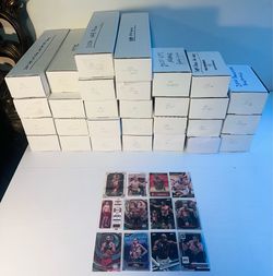 Huge lot of over 17,000 UFC cards. All major sets from Topps Chrome & Panini. Rookies, stars, parallels.
