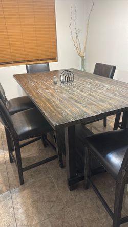 Dinner table with chairs