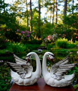 Vintage Italian ceramic swan figurines glossy white bodies Feathered Gray Wings 8"×8"