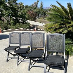 (4) World Market Black Wooden Folding Cane Back & Seat Chairs