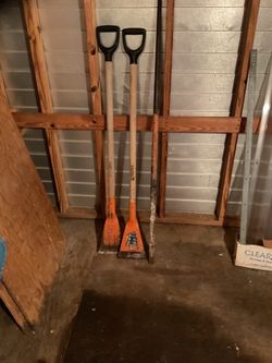 Two heavy duty floor scrapers and breaker bar. Sold as a group.