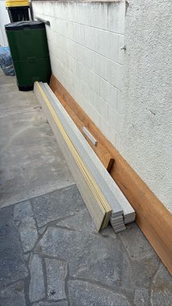Hardie plank concrete siding board and trim pieces, plus some wood