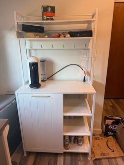 White Storage Cabinet with Shelves and Hooks