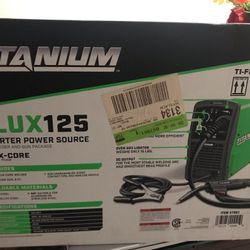 flux 125 welder / new in box 