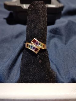 Used 14k  ring solid gold .. with colored cz .. stone