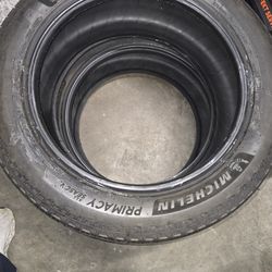 4. 275 50 21 Michelin Primacy all season tires 8 miles on them