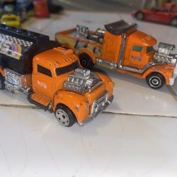 Two  Hot Wheel  Trucks