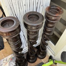 3 candelabros de madera x 20$
