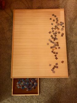 puzzle board with 4 drawers