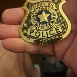 Metal Police Badge With Lapel Pin Attached