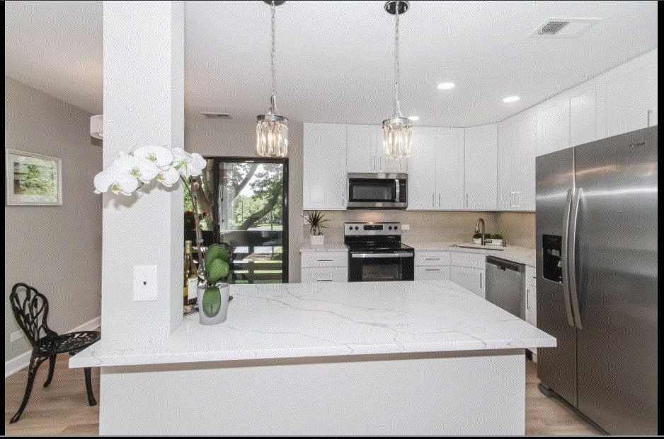 Kitchen cabinets - counter top - sink - faucet