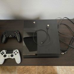 PS4 500GB w/ 8 games & 2 Controllers