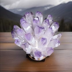 Purple Phantom Quartz Crystals in a natural shape.